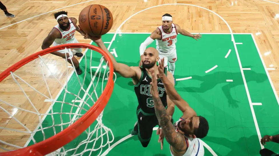 “Celtics Defeat Knicks to Stay Alive in Playoff Race”